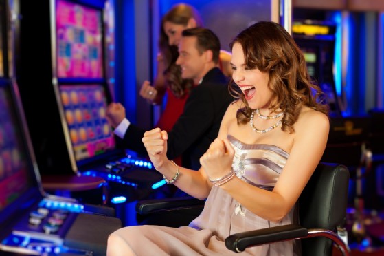 girl-on-a-slot-machine-all-obviously-are-winning-in-Las-Vegas-casino-Nevada-1600x1066.jpg